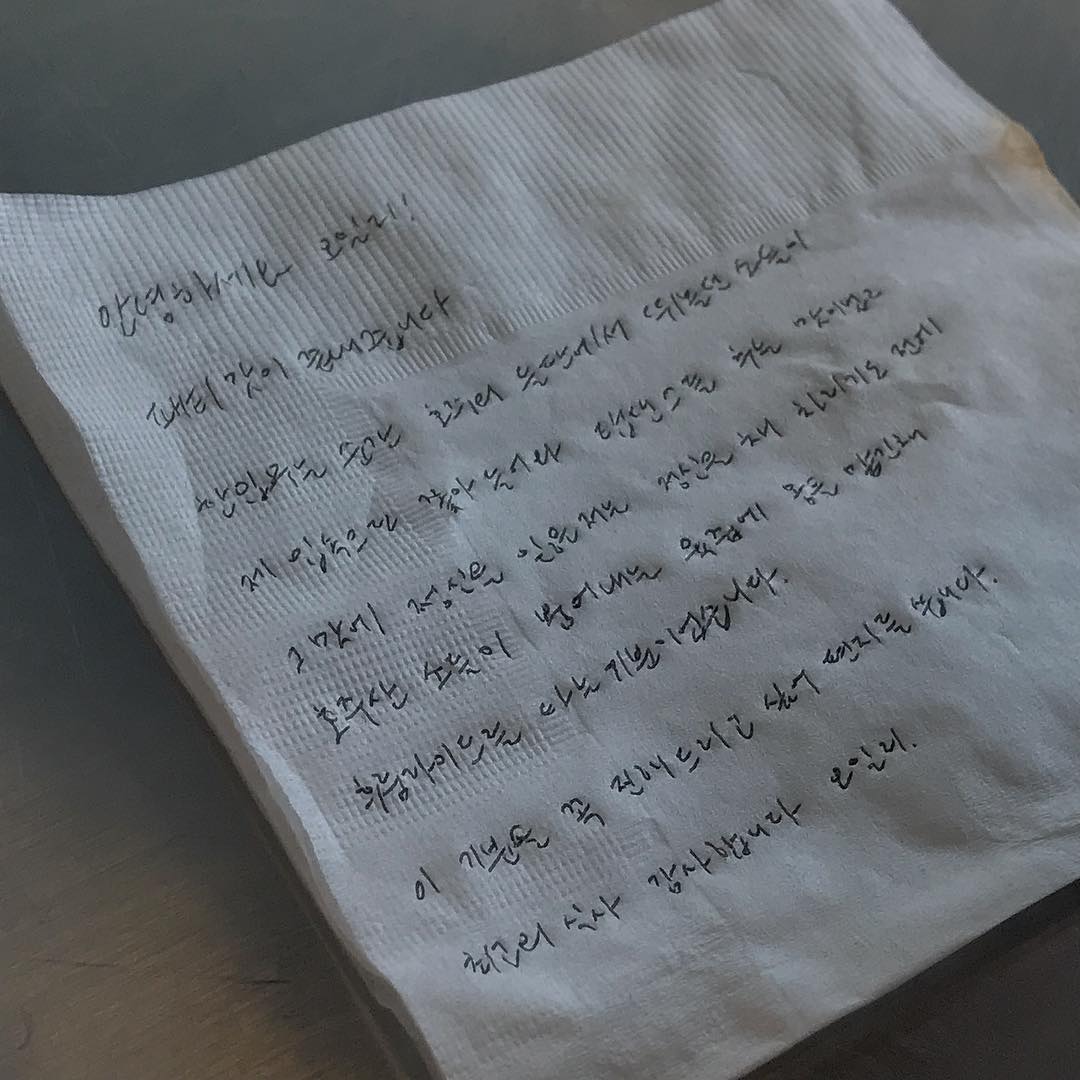 Handwritten fan letter on a paper napkin